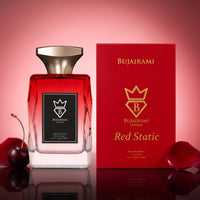 Bujairami Red Static Eau de Parfum 100ml bottle and box on a pink background with cherries